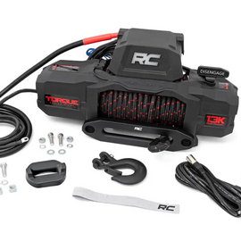 Rough Country 13,000lb electric winch mounted on a 4x4 truck for heavy-duty off-road recovery