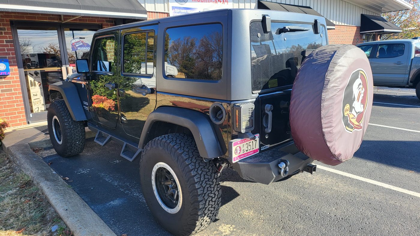Rear quarter showing BFG tires and FSU spare cover