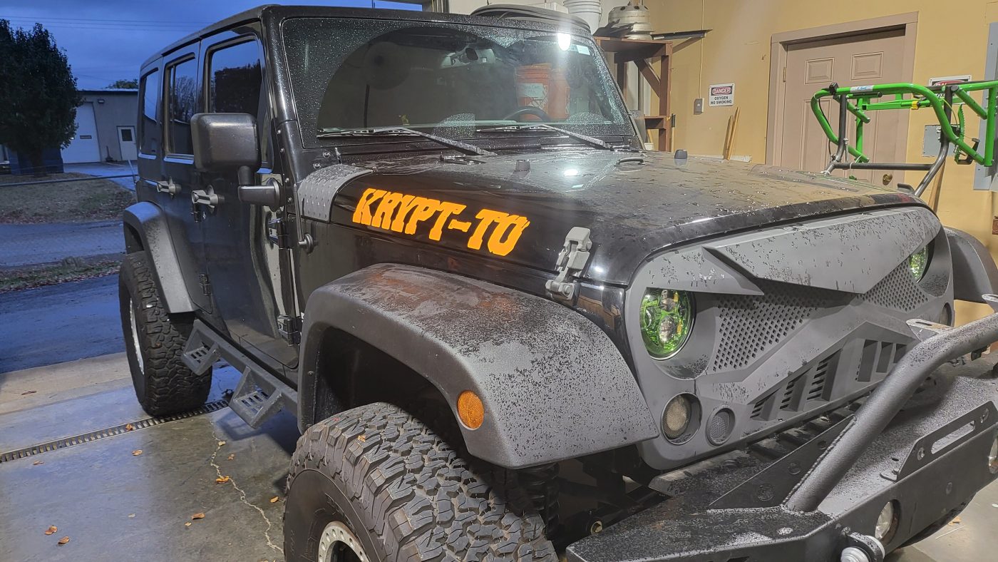 Passenger side with Krypt-To decal and new fender flares