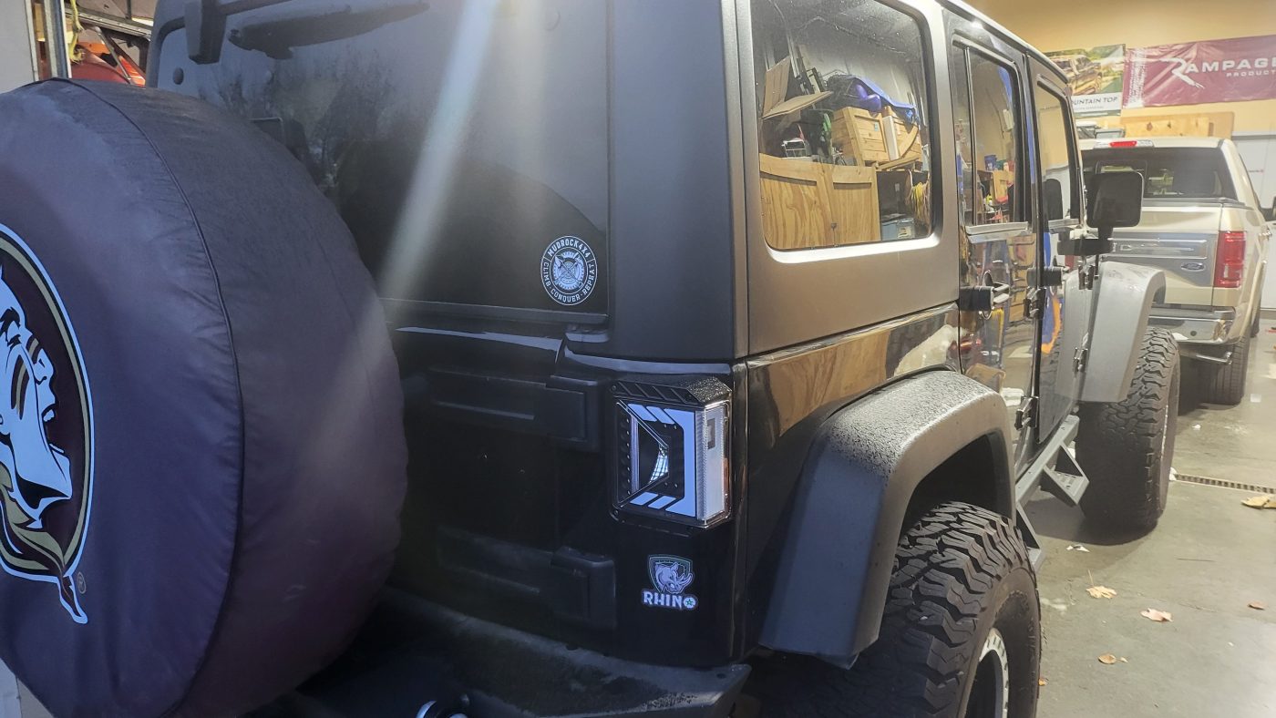 Rear quarter with new fender flares and tail lights