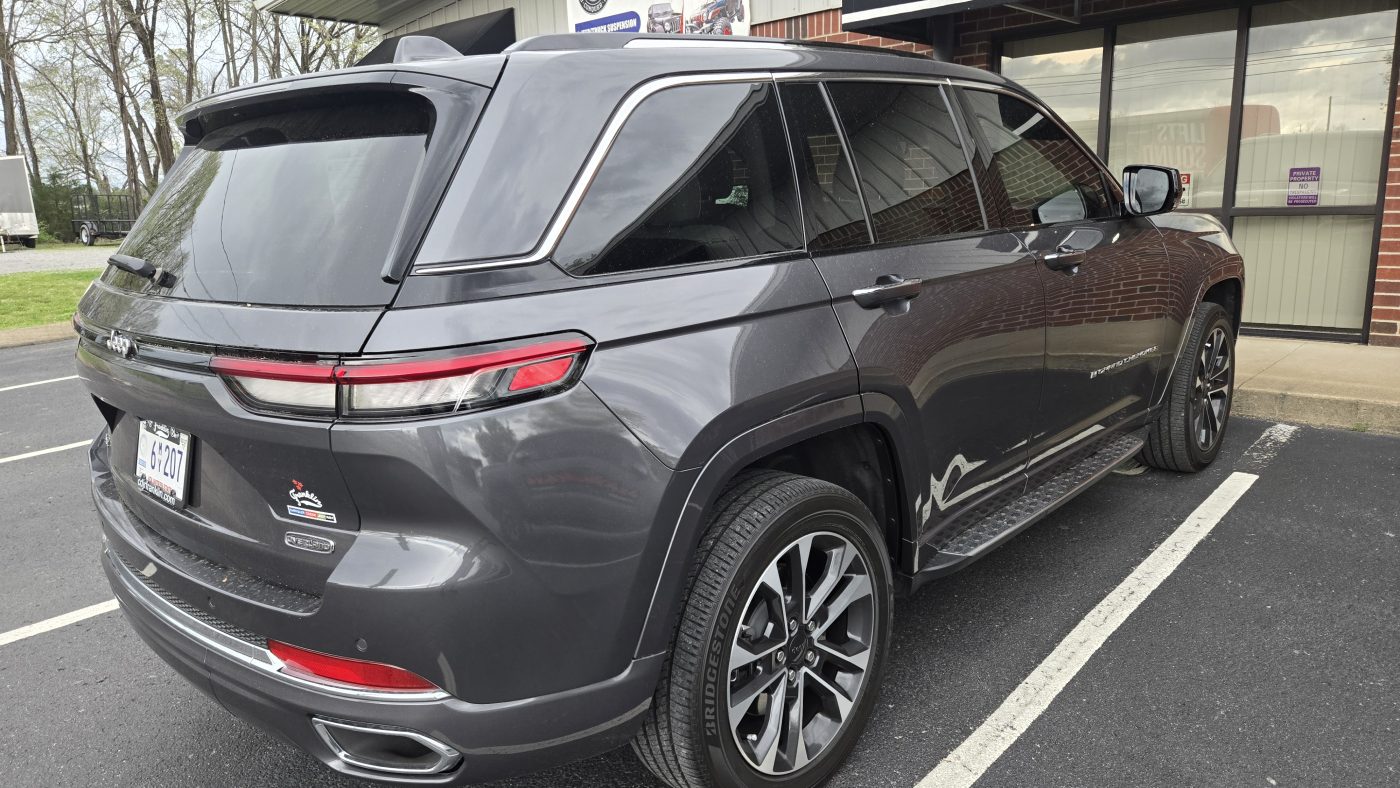 Safety cable routing around the frame